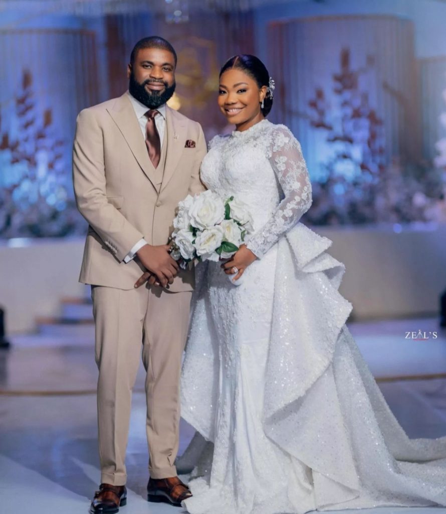 Mercy Chinwo and her husband at their wedding 